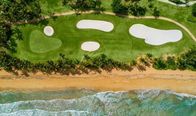 Rio Mar Hole #16 with ocean next to it.