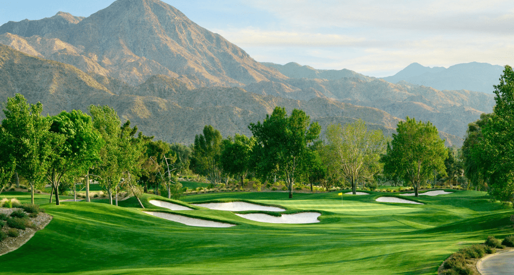 View of Indian Wells Golf Course including mountains and trees in the background